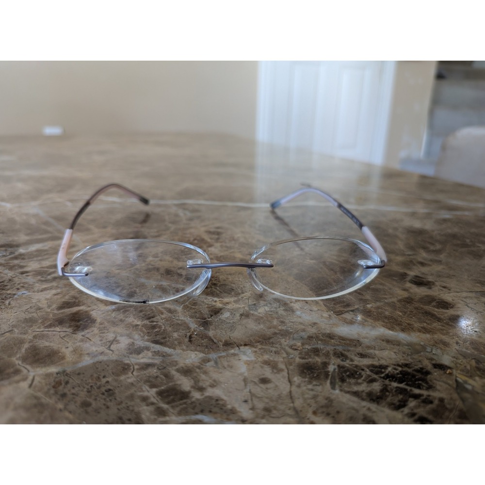 Silhouette Eyeglasses 4476 40 6053 52[]17 135 5416 Titan Creme Rimless Austria